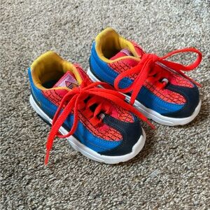 Nike Kids Sneakers in Red, Blue, and Yellow
